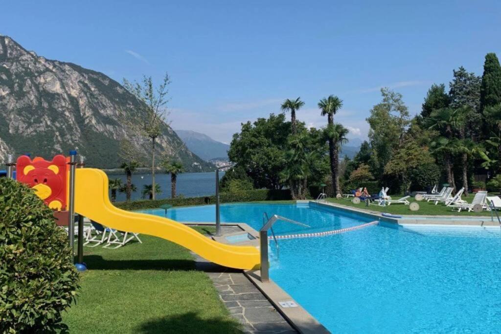 Luganersee, Pool, Strand, Parkplatz, Suite 比索内 外观 照片
