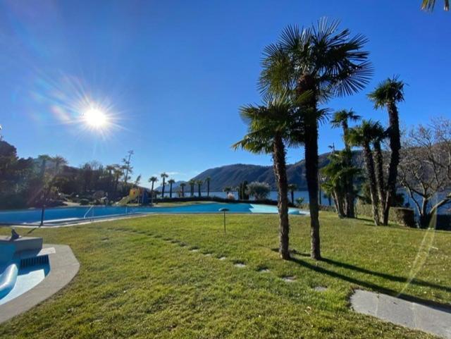 Luganersee, Pool, Strand, Parkplatz, Suite 比索内 外观 照片